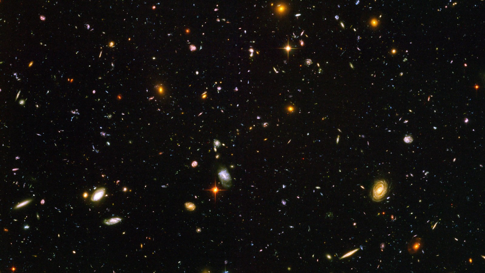 Distant galaxies in the Hubble Ultra Deep Field image assembled from real telescope exposures