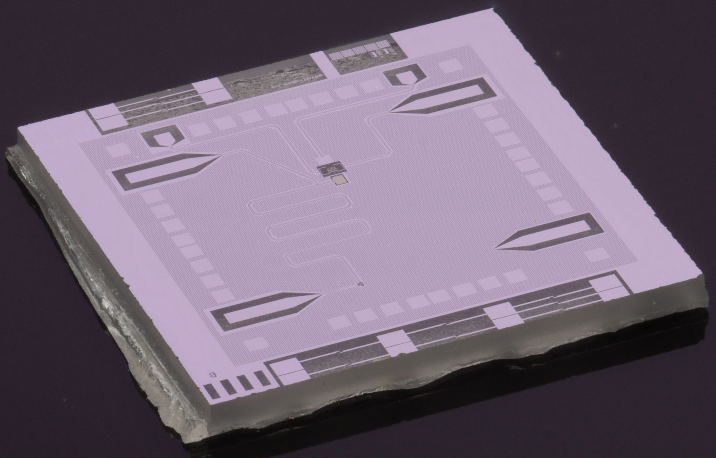 Historical superconducting circuit on a sapphire chip at NIST.