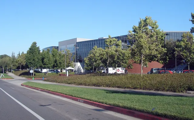Googleplex buildings and trees viewed from the north side of the campus.