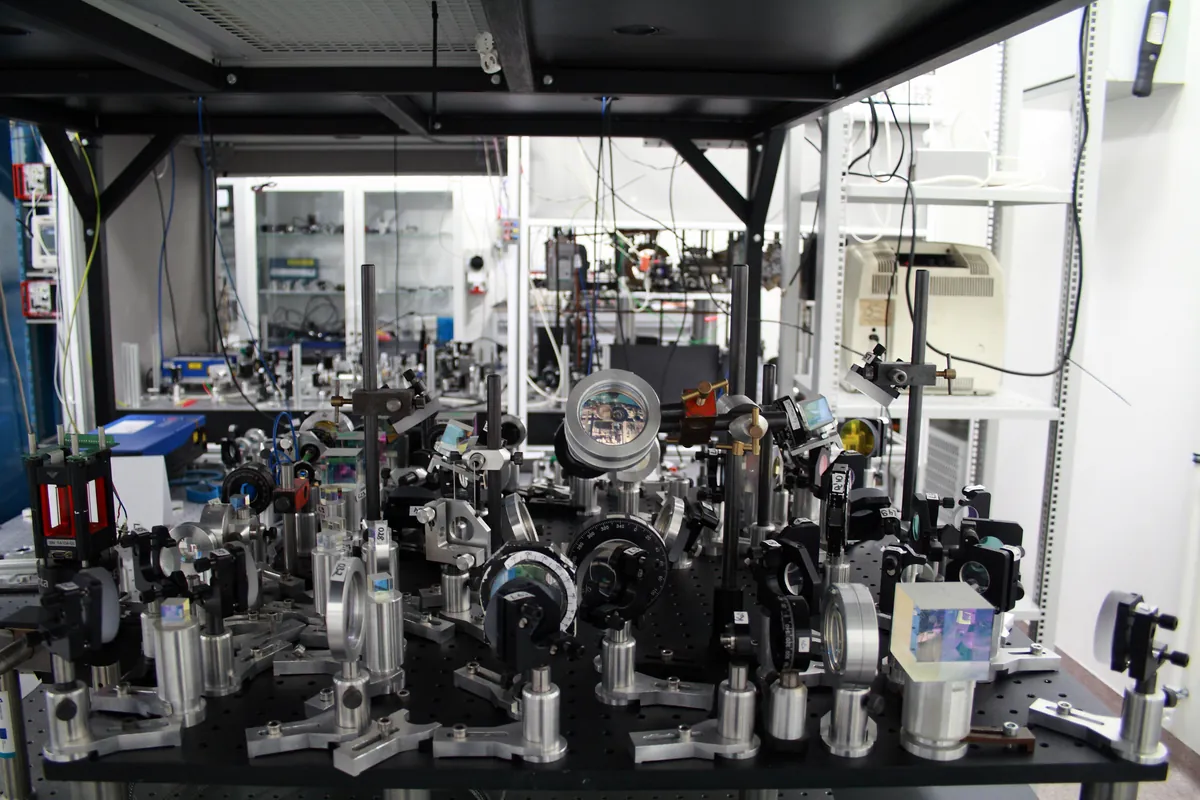 Optical components and vacuum equipment in a cold-atom laboratory.