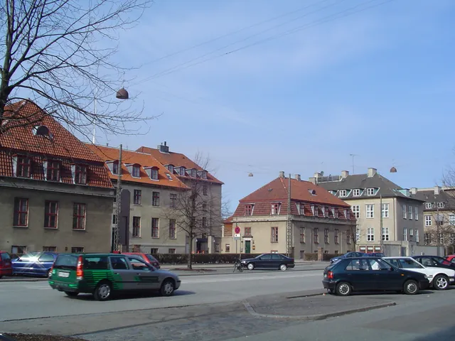 Historic buildings of the Niels Bohr Institute line a street in Copenhagen.