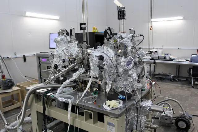 Vacuum chambers, cables and instruments around a scanning tunneling microscope.