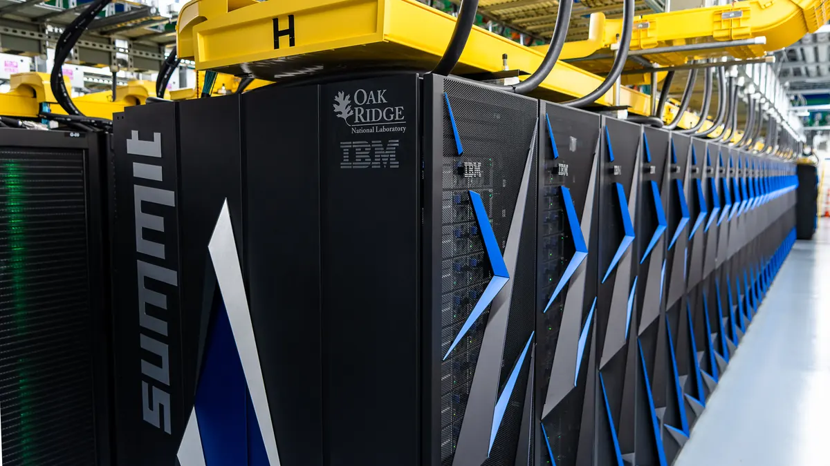 Rows of cabinets in a large classical supercomputer installation.