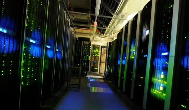 An aisle of server racks in The National Archives’ server room, photographed in 2011.