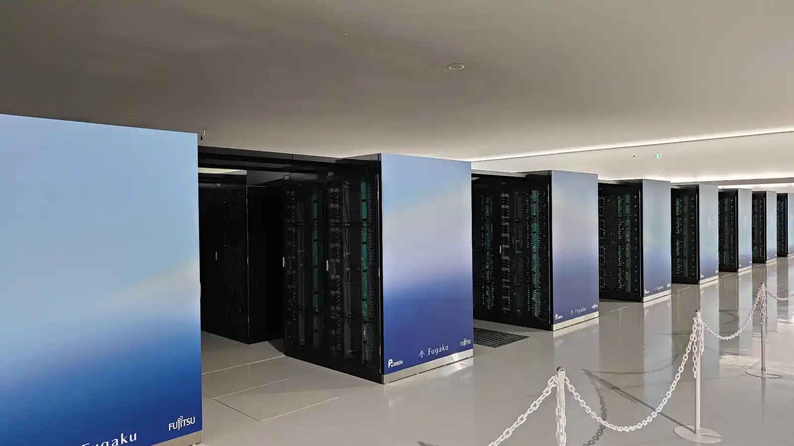 Rows of patterned Fugaku supercomputer cabinets at RIKEN in Kobe.