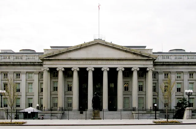 The columned front facade of the US Treasury Building in Washington, DC.